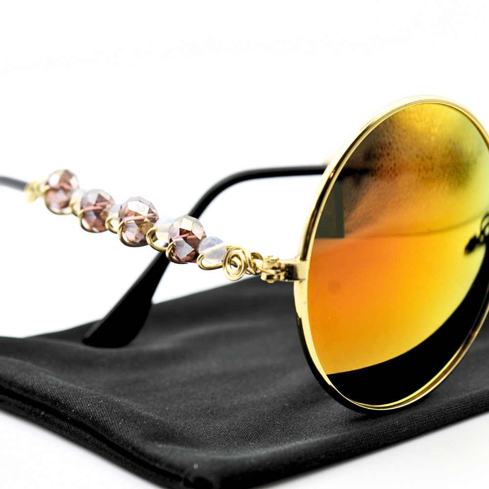 Round Sunglasses with Gold and Pink Accents
